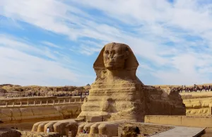<b class=qtipBold><figcaption>Egypt-Pyramids-Tourism-Giza</figcaption></b><br>The Sphynx is seen in the foreground as tourists visit the pyramids on the Giza Plateau, on the southern outskirts of the Egyptian capital Cairo on December 6, 2017. / AFP PHOTO / MOHAMED EL-SHAHED<br><em>© Copyright Agence France-Presse (AFP) - All Rights Reserved</em> Egypt-Pyramids-Tourism-Giza