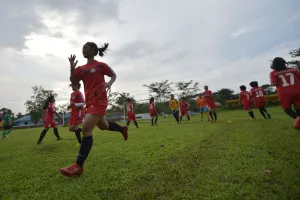 Prints of This photo taken on March 26, 2015 shows members of CSC (Cibubur Soccer Club). Women Soccer Indonesia taking part in a football training session in Jakarta Football Around The World Prints: Fbl-Indonesia-Women-Feature