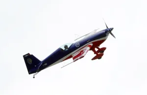 Plane Prints: Fighter pilot and aerobatic, Captain Pierre Varloteaux performs in his Extra 330