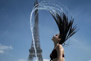 Eiffel Tower Prints: France-Eiffel Tower-woman-water-hair