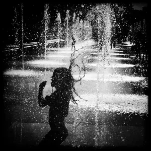 <b class=qtipBold><figcaption>France-Feature-Weather-Blackandwhite</figcaption></b><br>A picture taken with a mobile phone shows a girl running through water of a mirror fountain in Nice, southeastern France. / AFP PHOTO / Valery HACHE<br><em>© Copyright Agence France-Presse (AFP) - All Rights Reserved</em> France-Feature-Weather-Blackandwhite