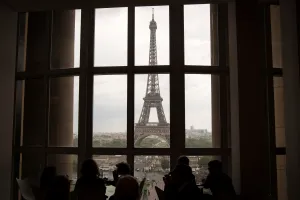 <b class=qtipBold><figcaption>France-Theme-From-My-Window</figcaption></b><br>A picture taken on May 16, 2016 in Paris shows the Eiffel Tower through a window. / AFP PHOTO / LIONEL BONAVENTURE<br><em>© Copyright Agence France-Presse (AFP) - All Rights Reserved</em> France-Theme-From-My-Window