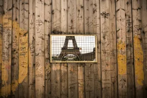 <b class=qtipBold><figcaption>France-Theme-From-My-Window</figcaption></b><br>A picture taken on May 15, 2016 in Paris shows the Eiffel Tower through a grill in wooden pannels surrounding a construction site. / AFP PHOTO / LIONEL BONAVENTURE<br><em>© Copyright Agence France-Presse (AFP) - All Rights Reserved</em> France-Theme-From-My-Window