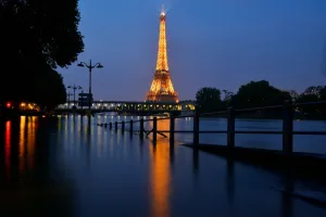 <b class=qtipBold><figcaption>France--Weather-Paris-Eiffel Tower</figcaption></b><br>A photo taken on June 5, 2016 at night shows the lit Eiffel Tower in front of the Seine river in front Beaugrenelle in Paris. AFP PHOTO / Bertrand GUAY<br><em>© Copyright Agence France-Presse (AFP) - All Rights Reserved</em> France--Weather-Paris-Eiffel Tower