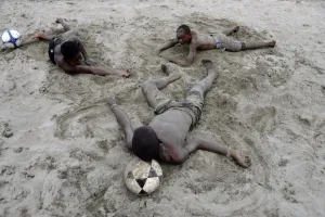 Child Prints: Garifuna Children Rest after Football