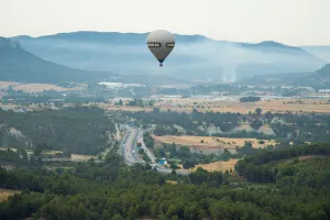 A hot-air balloon flies during the 21th European Balloon Festival in Igualada, near