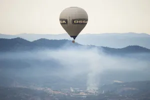A hot-air balloon flies during the 21th European Balloon Festival in Igualada, near