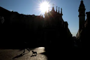 <b class=qtipBold><figcaption>Italy-Turin-Feature-Dog</figcaption></b><br>A person runs with her dog in Piazza San Carlo in Turin, on December 26, 2015. AFP PHOTO / MARCO BERTORELLO / AFP PHOTO / MARCO BERTORELLO<br><em>© Copyright Agence France-Presse (AFP) - All Rights Reserved</em> Italy-Turin-Feature-Dog