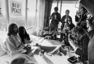 John Lennon and his wife Yoko Ono Receiving Journalists John Lennon and his wife Yoko Ono Receiving Journalists