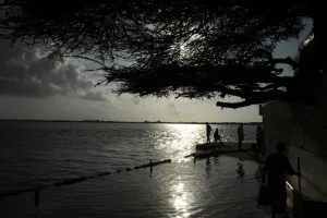 Lamu residents stand at the beach on October 2, 2011 at Ras Gitau, in Manda, Lamu archipelago Lamu residents stand at the beach on October 2, 2011 at Ras Gitau, in Manda, Lamu archipelago