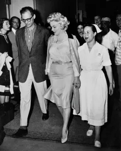 Marilyn Monroe and Arthur Miller leaving the Lennox Hill Hospital New York Marilyn Monroe and Arthur Miller leaving the Lennox Hill Hospital New York