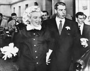 Marilyn Monroe with Joe DiMaggio, leaving San Franciscos City Hall following their marriage