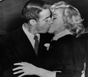 Marilyn Monroe Kisses Joe Di Maggio
