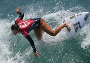 <b class=qtipBold><figcaption>SURFING-US OPEN</figcaption></b><br>Johanne Defay of France surfs during her women's heat in the first round of the US Open of Surfing at Huntington Beach, California on July 25, 2016. The event celebrates it's 57th year beside the historic Huntington Pier which is considered the birthplace of California's surfing culture. / AFP PHOTO / Mark Ralston<br><em>© Copyright Agence France-Presse (AFP) - All Rights Reserved</em> SURFING-US OPEN