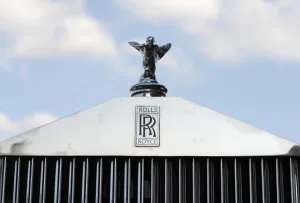 Africa Prints: An original hood ornament adorns the grill of a 1952 Rolls Royce during an antique