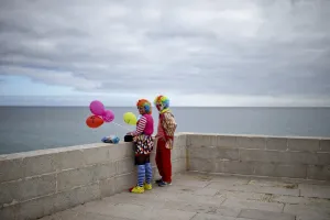 Ecuador, South America Prints: Portugal-Carnival-Clown-Parade