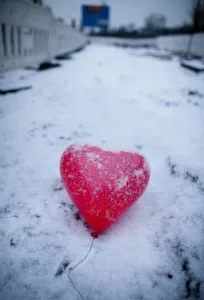 A red heart-shaped balloon lays in the snow on Februray 14, 2012 in Frankfurt/M., western Germany A red heart-shaped balloon lays in the snow on Februray 14, 2012 in Frankfurt/M., western Germany