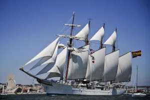 Sailing boat Juan Sebastian De Elcano sails at the Tejo River in Lisbon on July 22