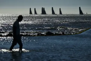 <b class=qtipBold><figcaption>Sailing-Portugal-Extreme-Series</figcaption></b><br>Silhouettes of people and sailing boats are pictured during an event of the Extreme Sailing Series on the Tagus River in Lisbon on October 8, 2016. / AFP PHOTO / PATRICIA DE MELO MOREIRA<br><em>© Copyright Agence France-Presse (AFP) - All Rights Reserved</em> Sailing-Portugal-Extreme-Series