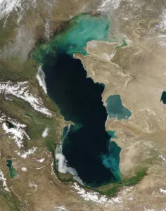 <b class=qtipBold><figcaption>SPACE-CASPIAN SEA</figcaption></b><br>This NASA Aqua satellite image released 15 April, 2004 shows the deep blue waters of the Caspian Sea. The most dramatic feature of the scene is the colorful water in the shallow, northern part (TOP) of the large lake. These blue and green swirls are probably a mixture of plant life, sediment, and organic matter washed in by the Volga River at upper left. The snow-covered mountain range at left center is the Caucasus. AFP PHOTO/NASA / AFP PHOTO / NASA / NASA<br><em>© Copyright Agence France-Presse (AFP) - All Rights Reserved</em> SPACE-CASPIAN SEA