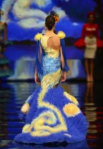 <b class=qtipBold><figcaption>SPAIN - FASHION - SIMOF - FLAMENCO</figcaption></b><br>A model presents creations by Angeles Galvez during the SIMOF 2017 (International Flamenco Fashion Festival) in Sevilla on February 3 ,2017 / AFP PHOTO / CRISTINA QUICLER<br><em>© Copyright Agence France-Presse (AFP) - All Rights Reserved</em> SPAIN - FASHION - SIMOF - FLAMENCO