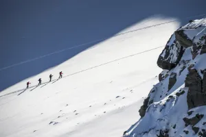 <b class=qtipBold><figcaption>Switzerland-Tourism-Ski-Touring</figcaption></b><br>Members of a ski touring group climb adjacent to the Bec des Rosses mountain on April 3, 2017 above the Swiss Alps resort of Verbier. / AFP PHOTO / Fabrice COFFRINI<br><em>© Copyright Agence France-Presse (AFP) - All Rights Reserved</em> Switzerland-Tourism-Ski-Touring