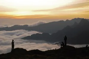 <b class=qtipBold><figcaption>Tanzania-Kilimanjaro-Feature</figcaption></b><br>Climbers look out at sunset during a trek up Mount Kilimanjaro, Tanzania on September 26, 2014. Mount Kilimanjaro is a dormant volcanic mountain in Tanzania. It is the highest mountain in Africa and the highest free-standing mountain in the world at 5, 895 metres or 19, 341 feet above sea level. AFP PHOTO/PETER MARTELL / AFP PHOTO / PETER MARTELL<br><em>© Copyright Agence France-Presse (AFP) - All Rights Reserved</em> Tanzania-Kilimanjaro-Feature