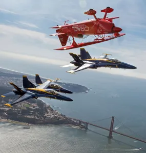 Prints of Team Oracle stunt pilot Sean Tucker (above) flies near the Golden Gate Bridge along with three U.S USA Prints: Team Oracle stunt pilot Sean Tucker (above) flies near the Golden Gate Bridge along with three U