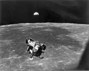 <b class=qtipBold><figcaption>Us-Apollo Xi-Rendezvous</figcaption></b><br>The lunar module, containing Neil Armstrong and Buzz Aldrin, approaches the Apollo 11 command module for a rendezvous 21 July 1969, with a half-Earth in the background. AFP PHOTO/NASA / AFP PHOTO / NASA / NASA<br><em>© Copyright Agence France-Presse (AFP) - All Rights Reserved</em> Us-Apollo Xi-Rendezvous