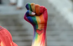 <b class=qtipBold><figcaption>Us-Rainbow-Fist-Colour-Orlando</figcaption></b><br>Dominique Hernandez displays her rainbow-colored fist, with heart painted on pulse in honour of those slain in the Orlando shootings aduring a vigil at Los Angeles City Hall on June 13, 2016 in Los Angeles, California. AFP PHOTO / FREDERIC J. BROWN<br><em>© Copyright Agence France-Presse (AFP) - All Rights Reserved</em> Us-Rainbow-Fist-Colour-Orlando