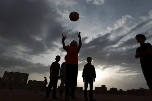 Prints of Yemeni children play football in a field in the capital Sanaa on June 10, 2014. AFP PHOTO/MOHAMMED HUWAIS (Photo by MOHAMMED HUWAIS / AFP) Football Around The World Prints: Yemen-Theme-Football