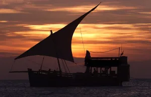 <b class=qtipBold><figcaption>ZANZIBAR-TOURIST</figcaption></b><br>A tourist boat sails at Stone Town port on Zanzibar Island at sunset. AFP PHOTO SIMON MAINA / AFP PHOTO / SIMON MAINA<br><em>© Copyright Agence France-Presse (AFP) - All Rights Reserved</em> ZANZIBAR-TOURIST